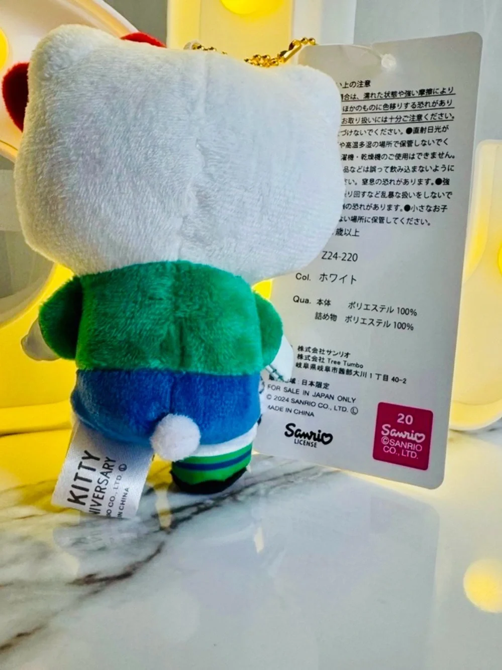 Sanrio Hello Kitty Plush in White, Red Bow & Green Jersey with Soccer Ball